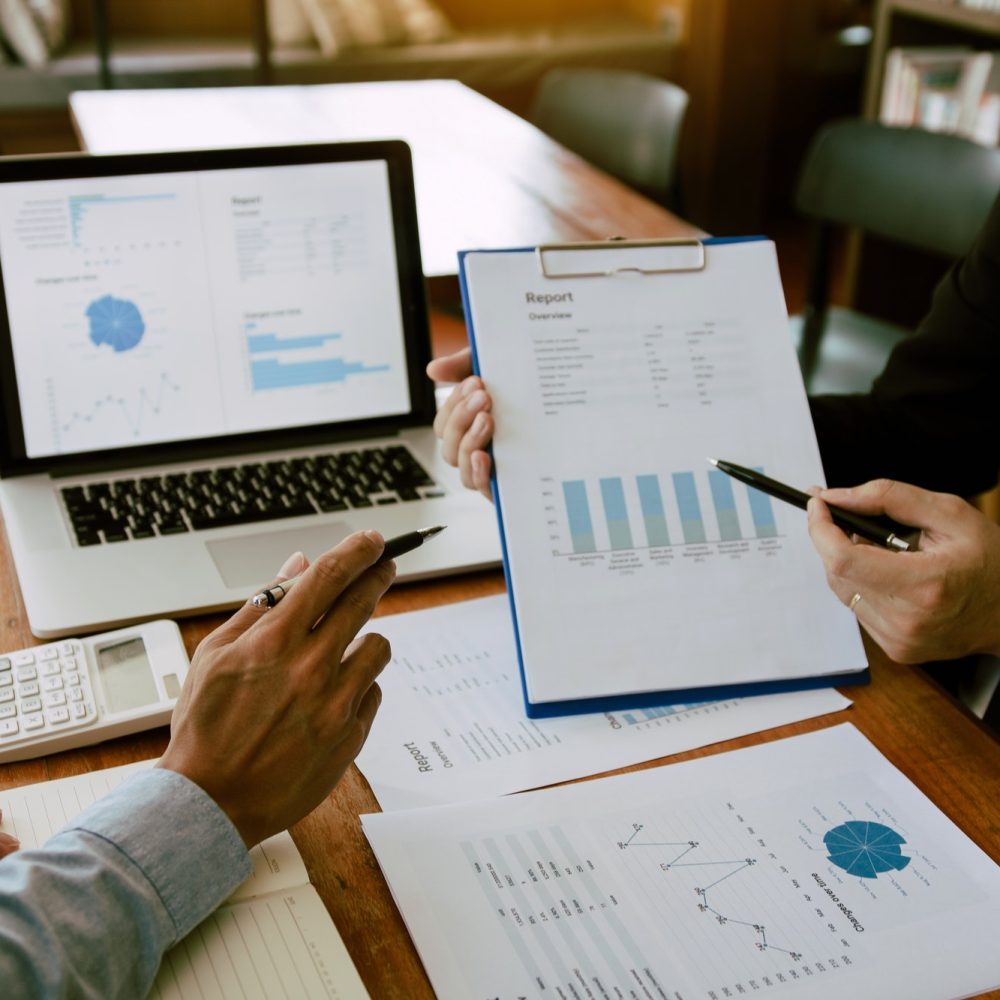 two-business-partnership-coworkers-analysis-strategy-with-discussing-a-financial-planning-graph-and.jpg two-business-partnership-coworkers-analysis-strategy-with-discussing-a-financial-planning-graph-and.jpg
